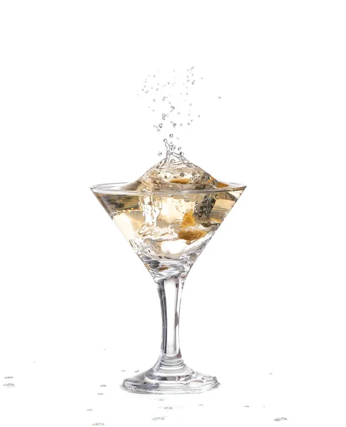 Two wine swirling in a goblet martini glass, isolated on a white background — Stock Photo, Image