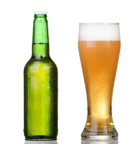 Chilled green bottle with condensate and a glass of beer lager on Isolated white background — Stock Photo, Image