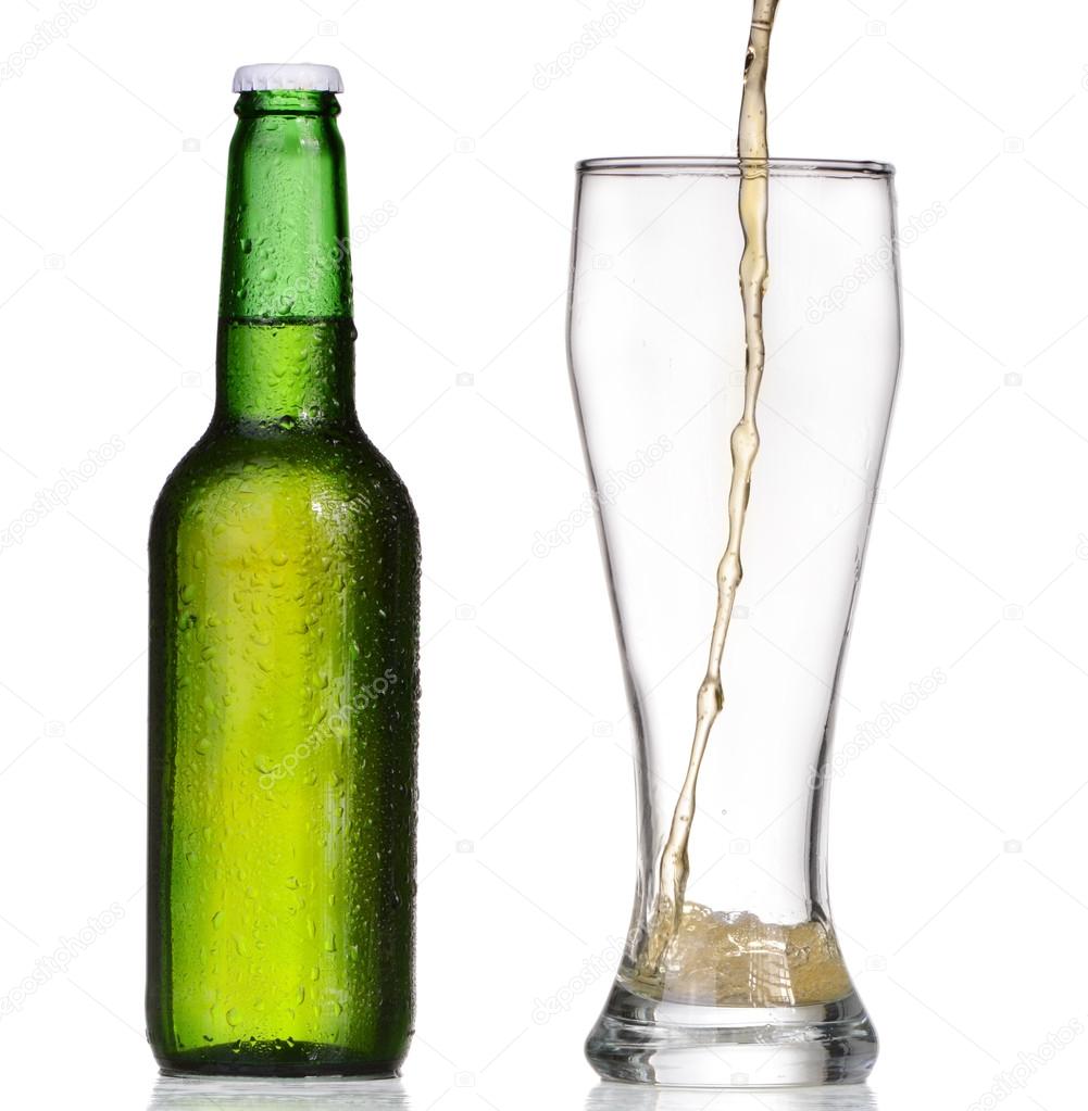 Pouring beer from bottle isolated on white background