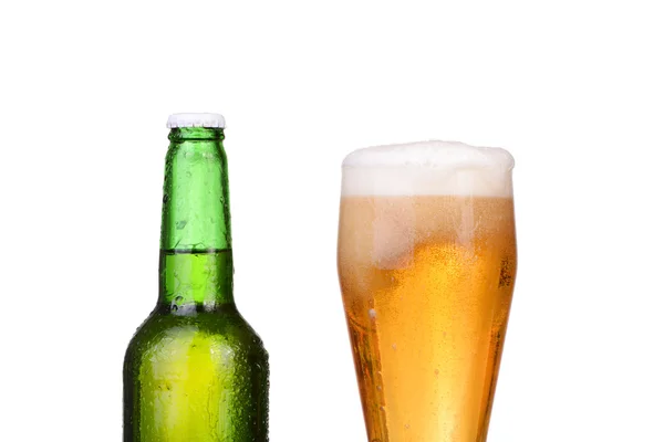 Chilled green bottle with condensate and a glass of beer lager on Isolated white background — Stock Photo, Image