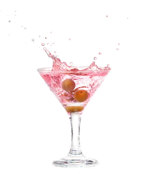 Splash from olive in a glass of cocktail, isolated on the white background, clipping path included. — Stock Photo, Image