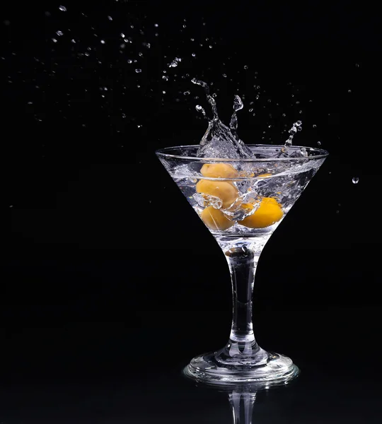 Vermouth cocktail inside martini glass over dark background — Stock Photo, Image