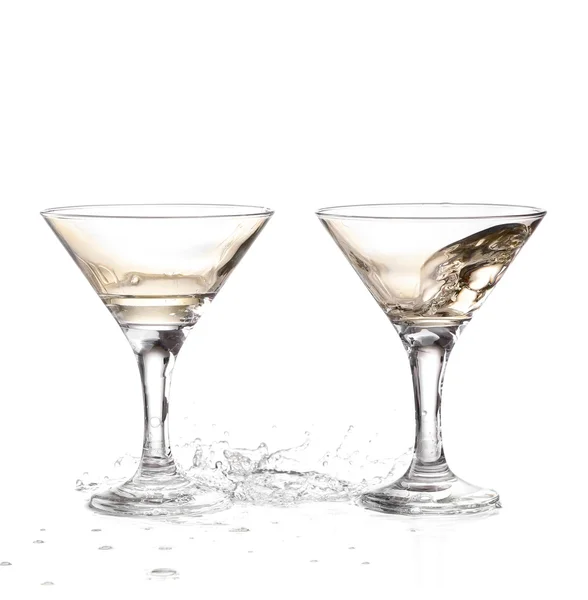 Two wine swirling in a goblet martini glass, isolated on a white background — Stock Photo, Image