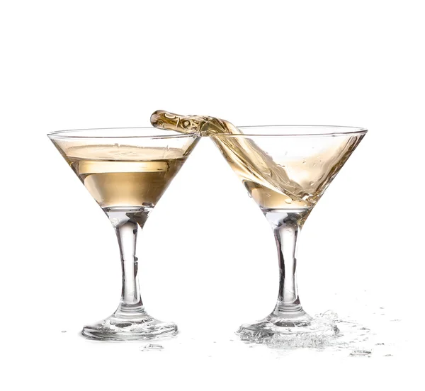 Two wine swirling in a goblet martini glass, isolated on a white background — Stock Photo, Image