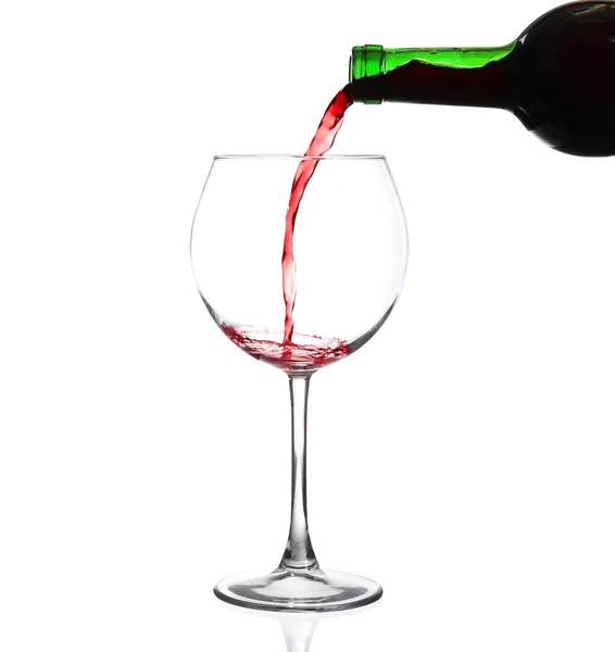 Red wine pouring on white background — Stock Photo, Image