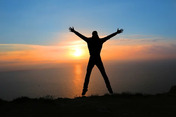 Silhouette of person in mountain. Sport and active life — Stock Photo, Image