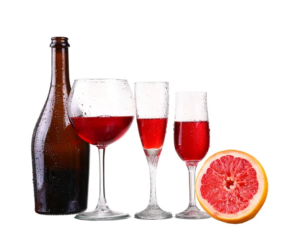 Set van glazen met rode wijn grapefruit — Stockfoto