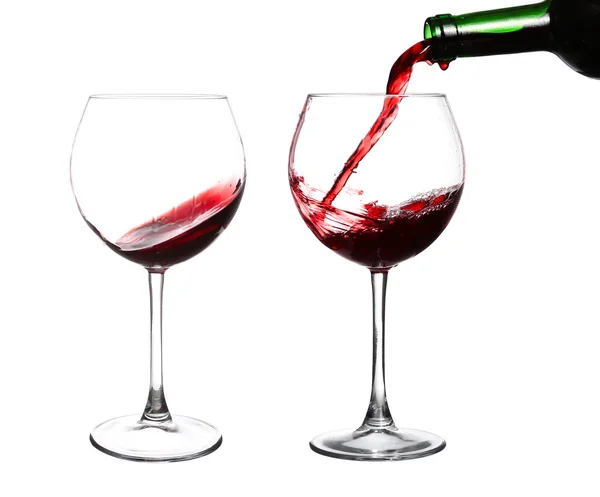 Egy talpas pohár bor pohár, elszigetelt fehér ba kavargó vörösbor — Stock Fotó