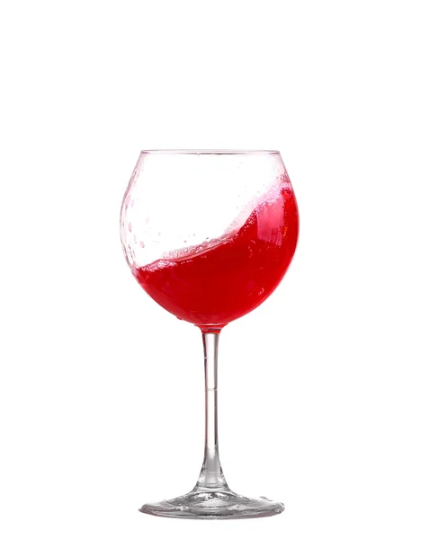 Red wine splashing in a glass, isolated on white — Stock Photo, Image