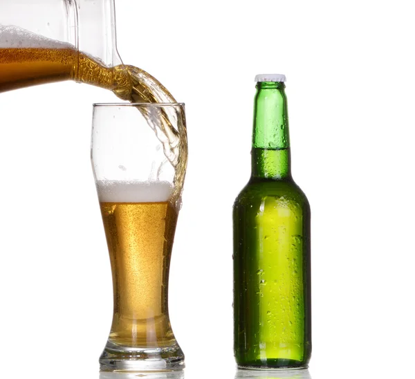 Isolated Glass and Brown bottle of beer on a white background — Stock Photo, Image