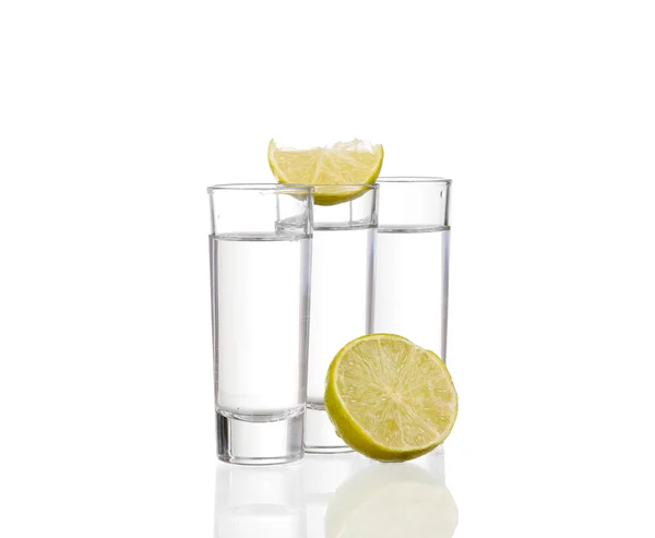 Three  tequila shots with lime isolated on white background — Stock Photo, Image