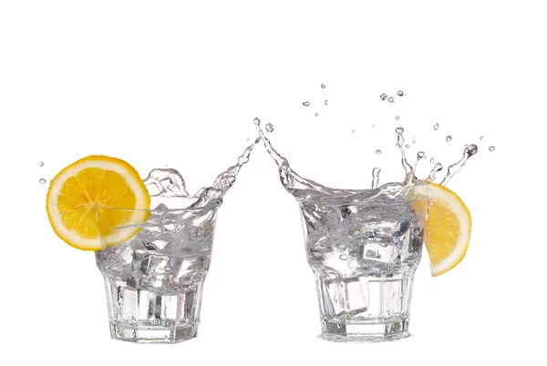 Collage Cubos de hielo salpicando en un vaso de agua, aislado en blanco — Foto de Stock