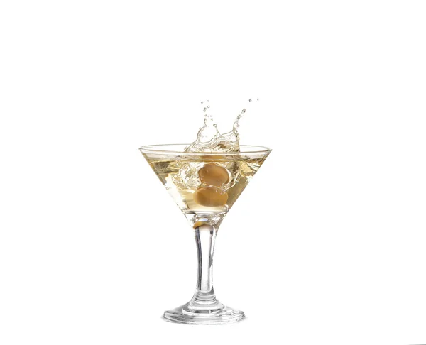 Splash from olive in a glass of cocktail, isolated on the white background, clipping path included. — Stock Photo, Image