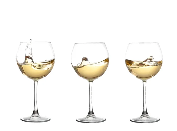 Egy talpas pohár bor pohár, elszigetelt fehér kavargó, fehér bor — Stock Fotó