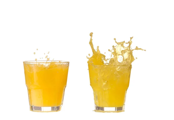 Suco de laranja em um copo — Fotografia de Stock