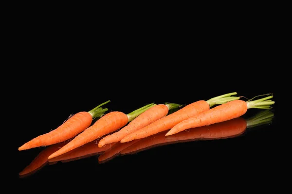 Морковь и сок в стакане — стоковое фото