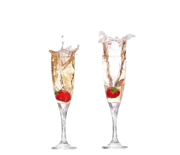Collage Fraise simple éclaboussant dans une coupe de champagne — Photo
