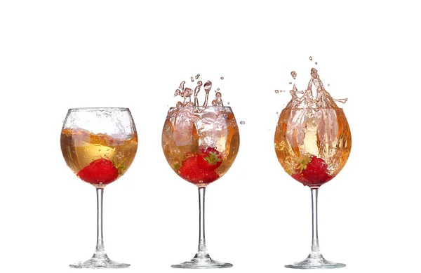 Collage Single Strawberry splashing into a glass of wine — Stock Photo, Image