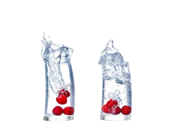 Collage cherry splash en una copa de cóctel en blanco —  Fotos de Stock