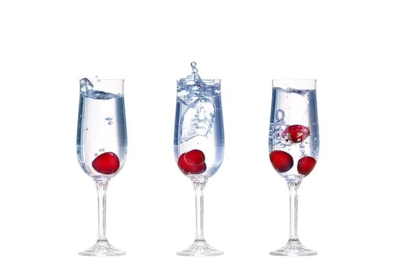 Cherry splash in a cocktail glass on white — Stock Photo, Image