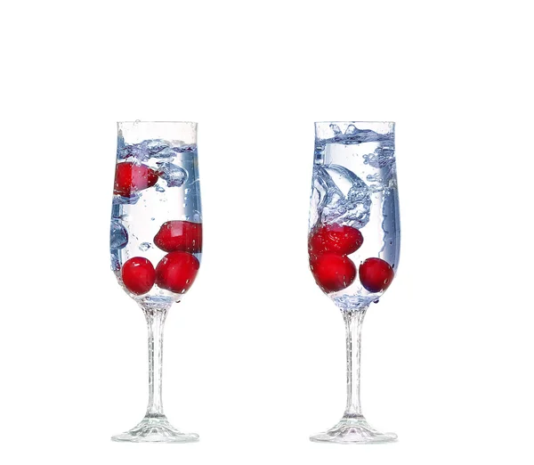 Collage cherry splash in a cocktail glass on white — Stock Photo, Image