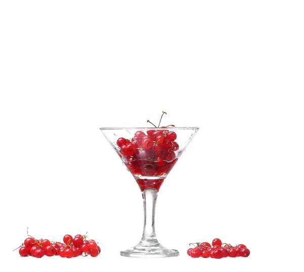 Water with red currants isolated on white — Stock Photo, Image