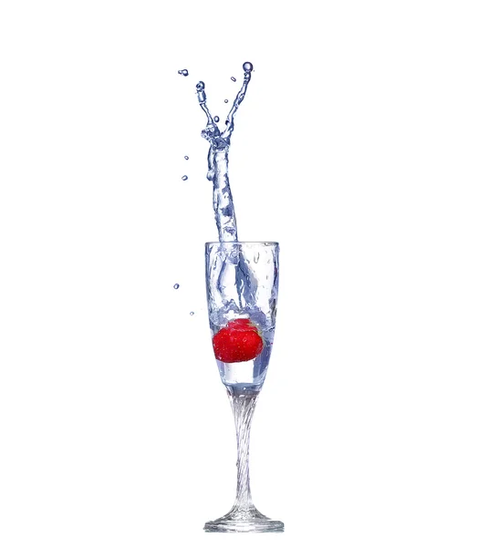 Strawberry splash in a cocktail glass on white — Stock Photo, Image