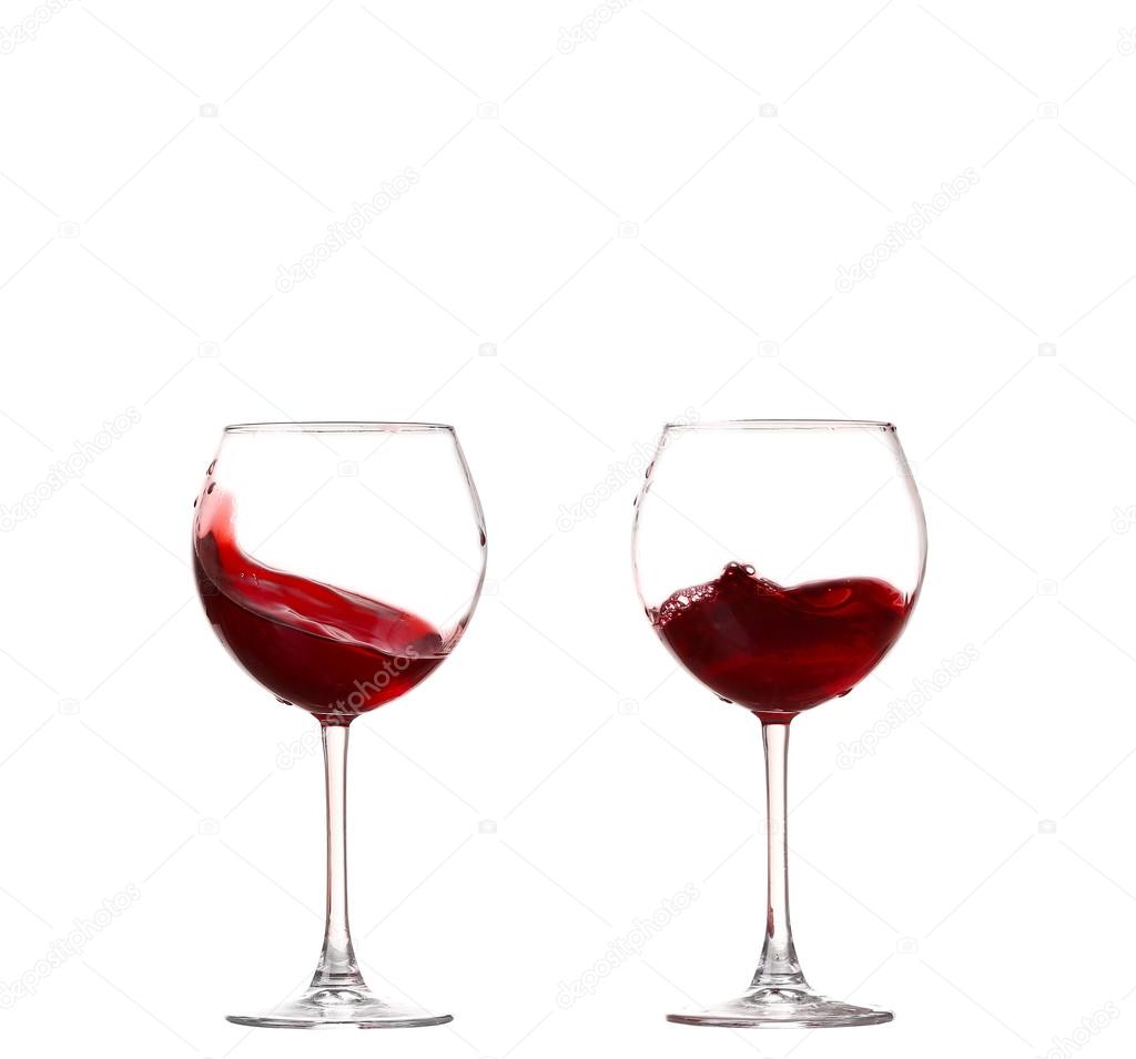 Wine collection - Splashing red wine in a glass. Isolated on white background