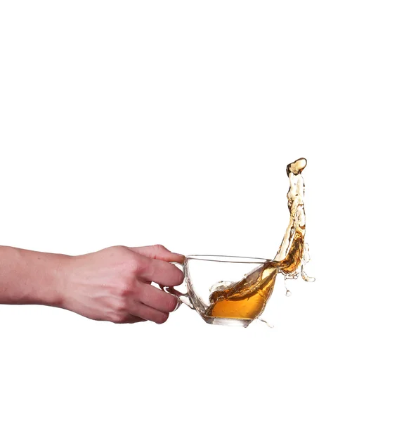 スプラッシュとお茶のグラス — ストック写真