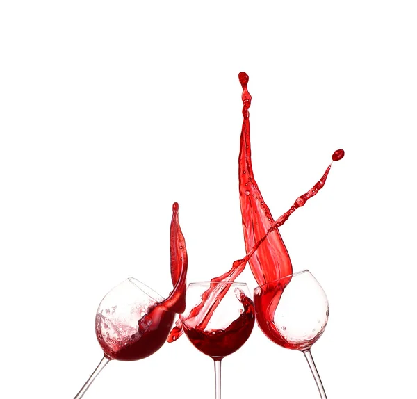Collage Vino rosso spruzzato da vetro, isolato su fondo bianco — Foto Stock