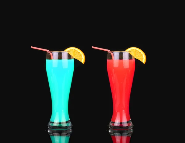 Collage Blue alcoholic cocktail with a slice of orange on a black background — Stockfoto