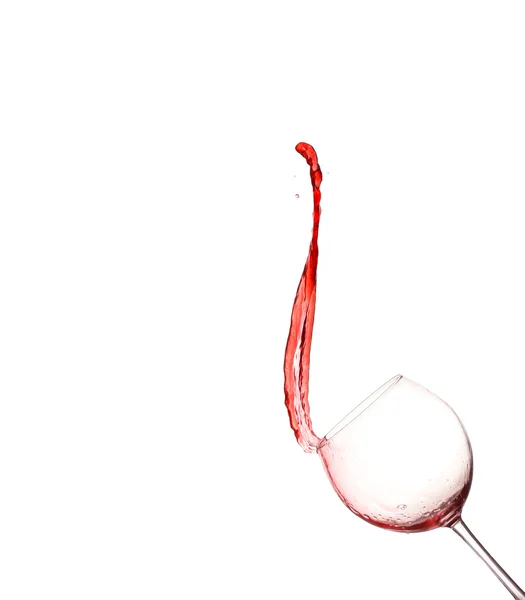 Red wine splashing from glass, isolated on white background — Stock Photo, Image