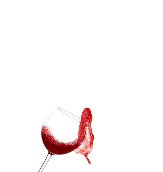 Red wine splashing from glass, isolated on white background — Stock Photo, Image