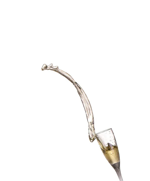 スプラッシュ、白で隔離されるとシャンパンのグラス — ストック写真