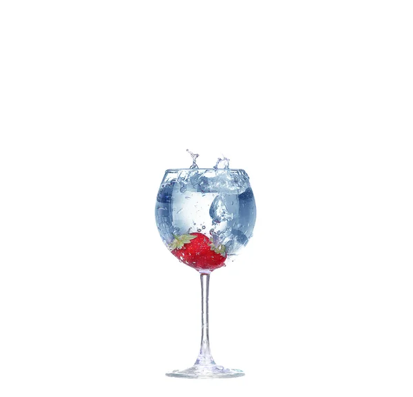 Strawberry splash in a cocktail glass on white — Stock Photo, Image