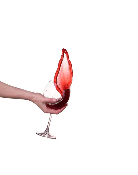 Красное вино брызги из стекла, изолированные на белом фоне — стоковое фото