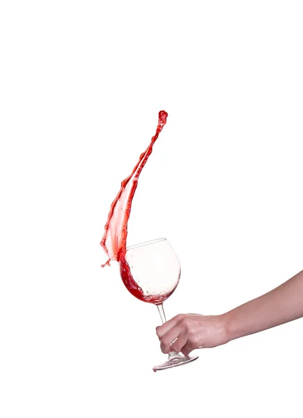 Red wine splashing from glass, isolated on white background — Stock Photo, Image