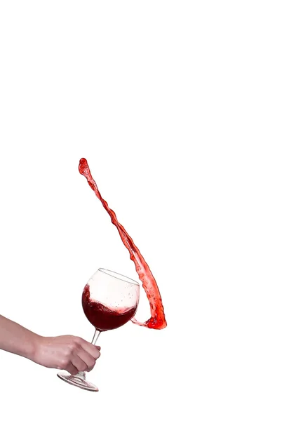 Red wine splashing from glass, isolated on white background — Stock Photo, Image