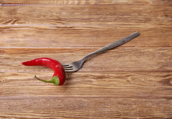 Chilli peppers and wood texture , background. — Stock Photo, Image