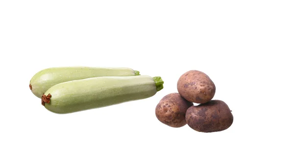 Zucchini med potatis på en vit — Stockfoto