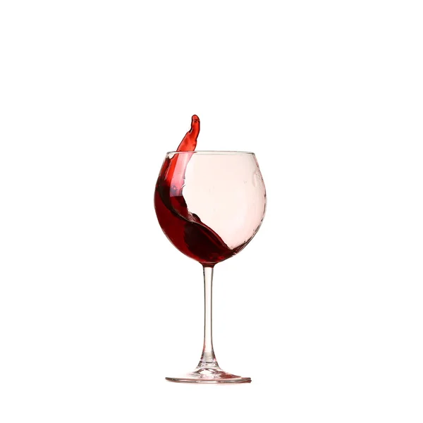 Červené víno sklo na bílém pozadí, splash — Stock fotografie
