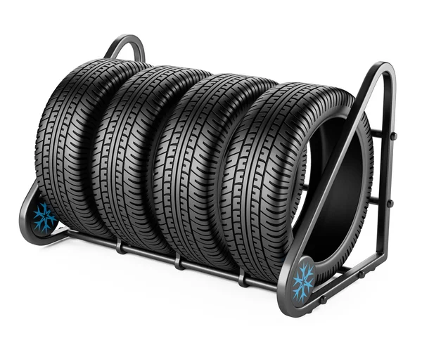 Neumáticos de invierno puestos a la venta en una tienda de neumáticos . — Foto de Stock