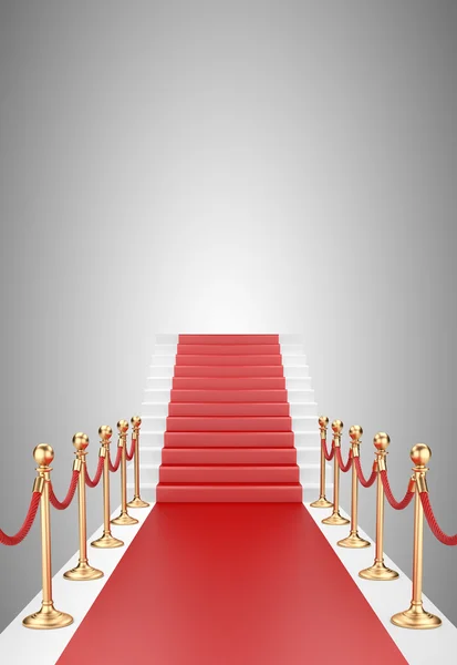 Staircase and red carpet between two gold stanchions with rope — Stock Photo, Image