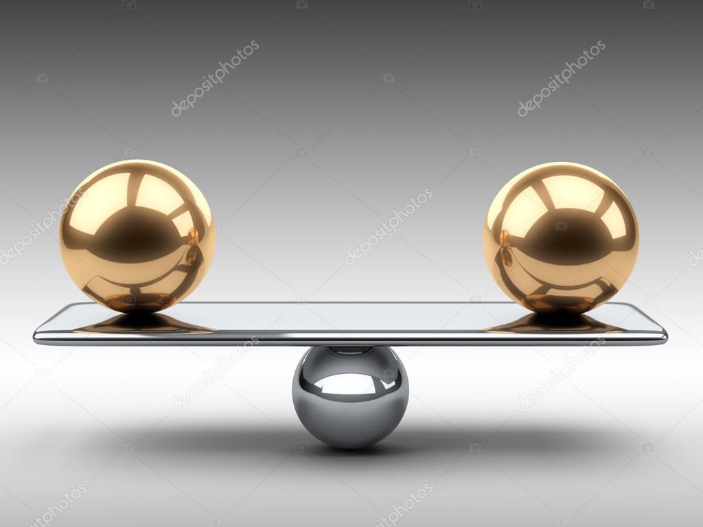 Balance between two large gold spheres. 