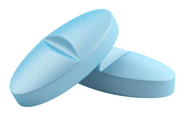 Nära håll två blå medicinska tabletter — Stockfoto