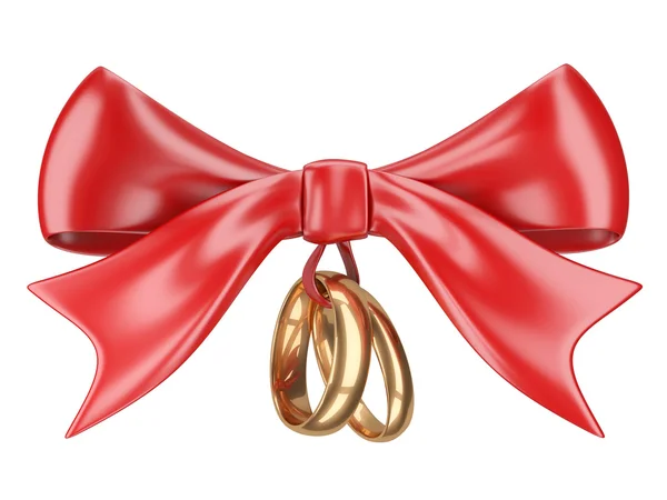 Wedding rings tied red ribbon and bow. — Stock Photo, Image