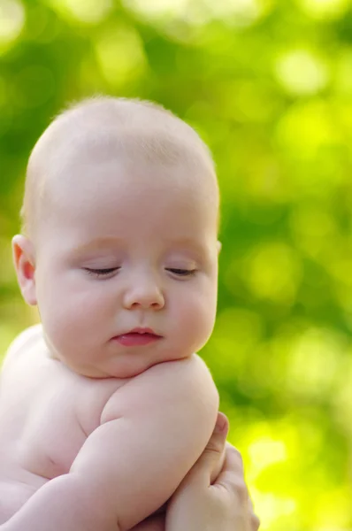 Baby on green — Stock Photo, Image