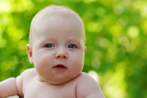 Baby on green — Stock Photo, Image