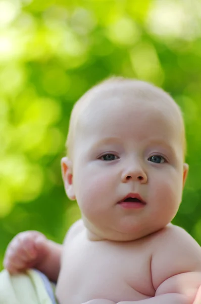 Baby on green — Stock Photo, Image