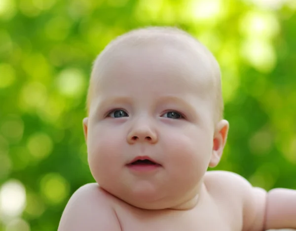 Baby on green — Stock Photo, Image